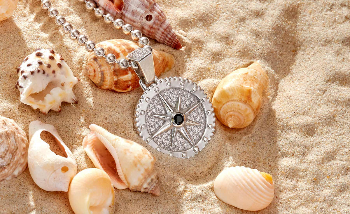 Atolyestone Silver Compass Necklace on Sand