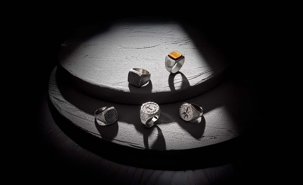 Men's Solid Silver Rings under Spotlight