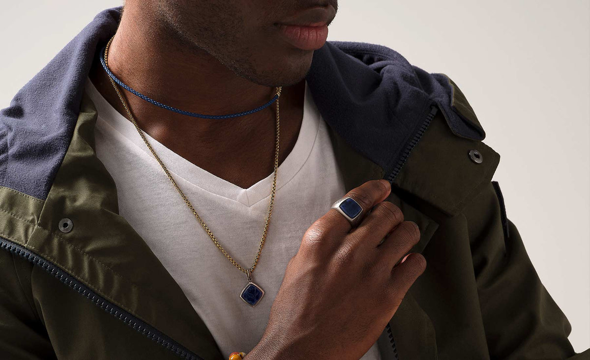 Solid Silver Atolyestone Ring on the Index Finger of Model