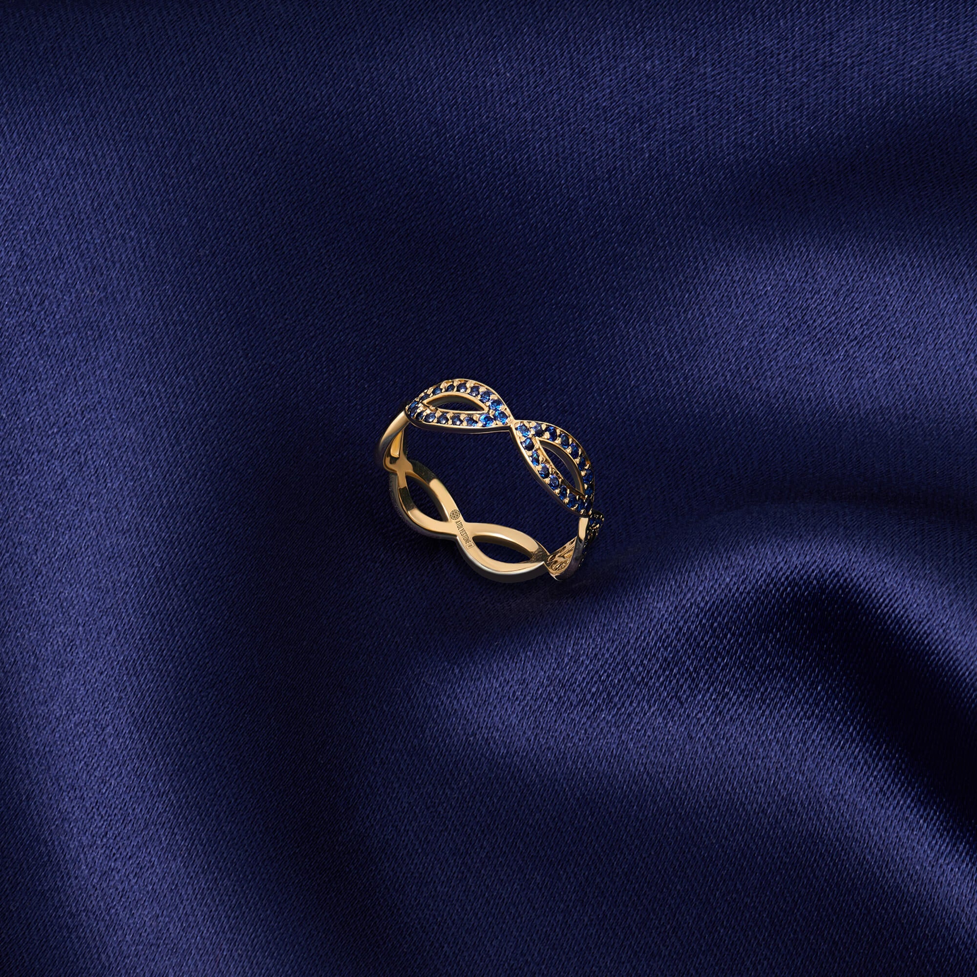 Sapphire Loop Design Ring in Solid Gold